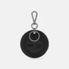 Ronde, dubbelzijdige leren sleutelhanger Ronde, dubbelzijdige leren sleutelhanger